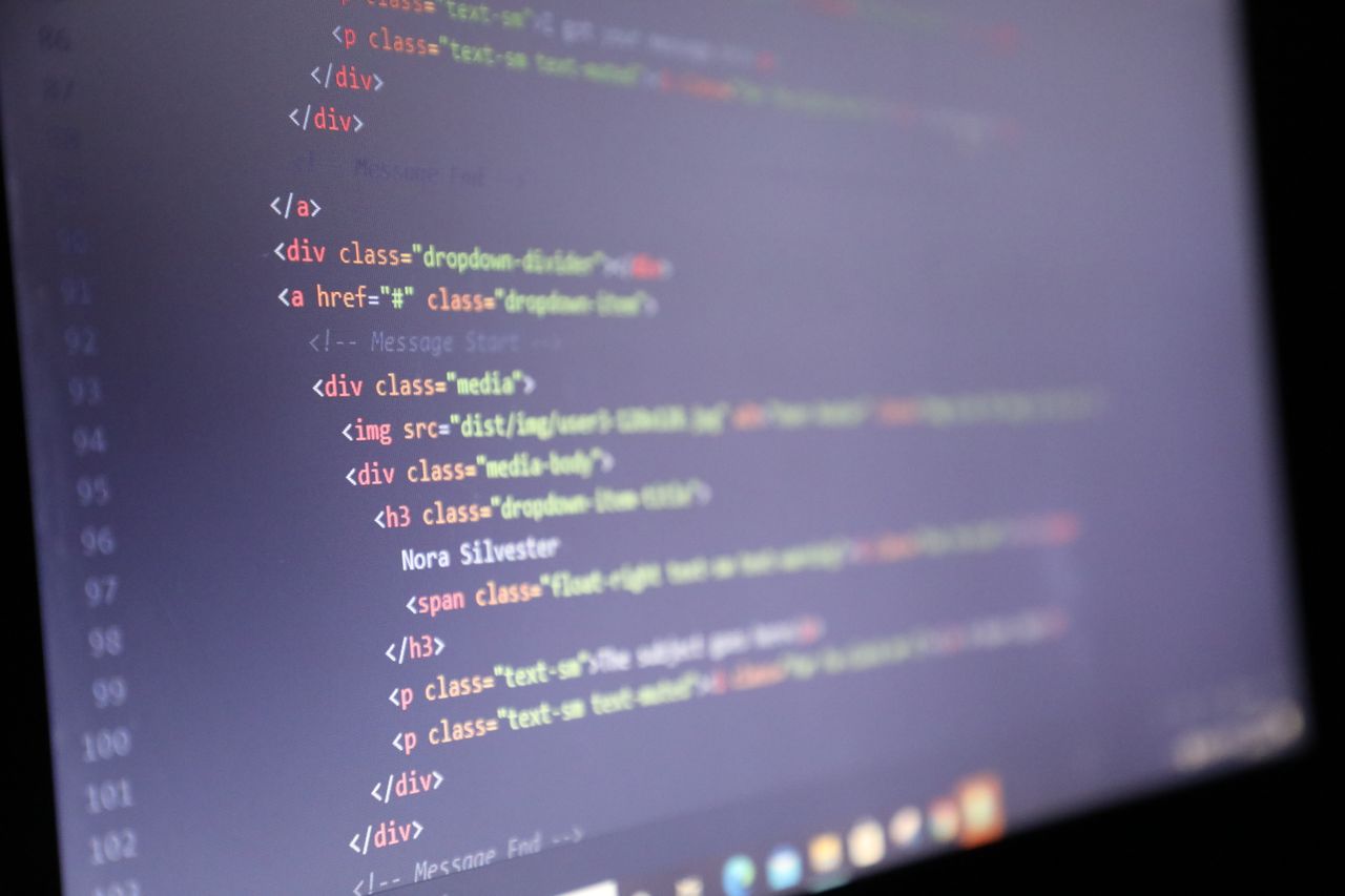 Photograph of a computer screen showing source code