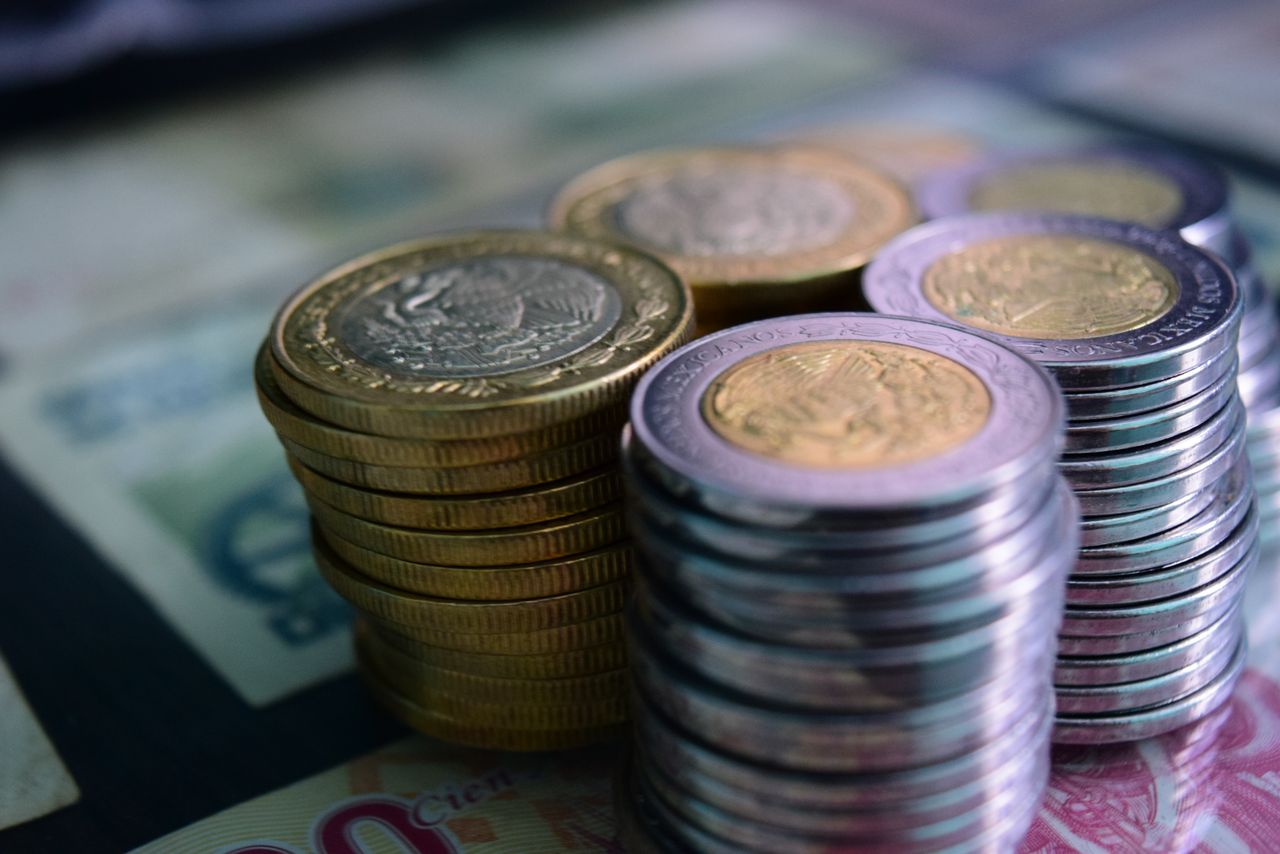 Photograph of coins stacked in towers